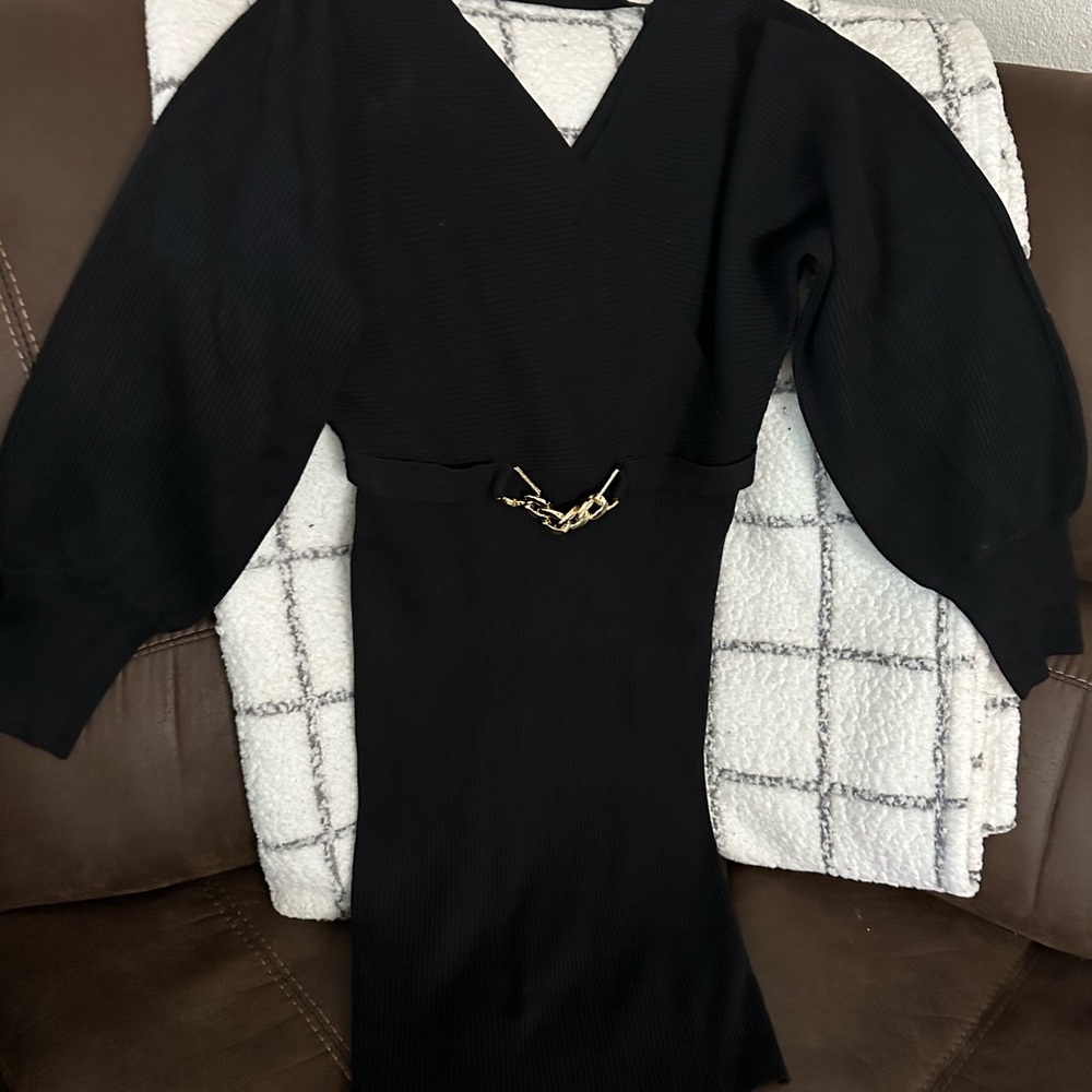 Chic Black Dress with Gold Chain Detail